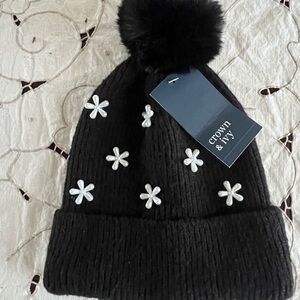 Crown and Ivy Black Beanie with White Floral Accent